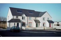 Manmade slate with solar panels fitted in the roof